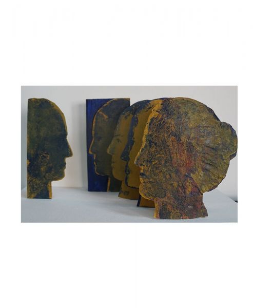 Genealogy. 2015 Sculpture, oil on canvas, engraving in wood 35 X 15 X 18.5